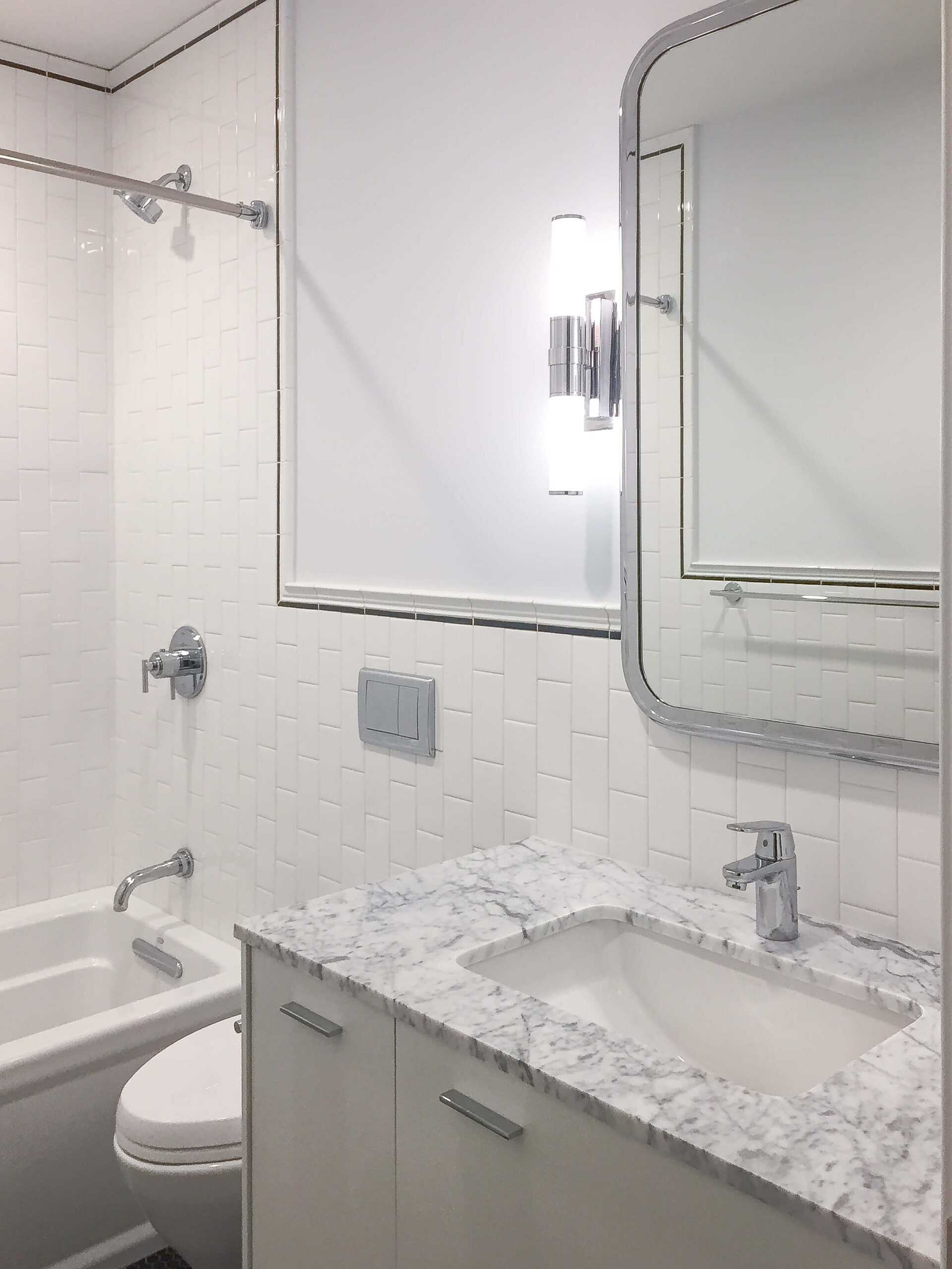 transitional bathroom , subway wall tile , marble countertop , custom home , full house renovation , home renovation